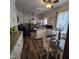 Cozy kitchen with a ceiling fan, stainless steel appliances, and granite countertops at 1309 Eastern Avenue Ave, Rocky Mount, NC 27801