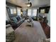 Comfortable living room with hardwood floors, a leather sofa, and modern decor at 1309 Eastern Avenue Ave, Rocky Mount, NC 27801