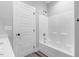 Clean bathroom with a bathtub, shower, and white vanity at 157 Rainbow Dr, Dunn, NC 28334