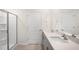 Modern bathroom with double vanity and walk-in shower at 1744 Post Oak Dr, Haw River, NC 27258