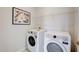 Functional laundry room equipped with a modern washer and dryer at 179 Deodora Ln, Cameron, NC 28326