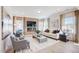 Living room with fireplace, large windows and neutral decor at 179 Deodora Ln, Cameron, NC 28326