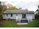 Home features a deck and spacious backyard at 1924 Edgeleaf Dr, Willow Springs, NC 27592