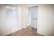 Well-lit bedroom with mirrored closet and window blinds at 1924 Edgeleaf Dr, Willow Springs, NC 27592
