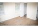 Bedroom with mirrored closet and window with blinds at 1924 Edgeleaf Dr, Willow Springs, NC 27592