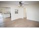 Open living area with a view into the kitchen and access to other rooms at 1924 Edgeleaf Dr, Willow Springs, NC 27592