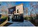 Modern two-story home with dark exterior and balcony at 2407 Hart Street # B, Durham, NC 27703