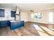 Open concept kitchen with island and stainless steel appliances at 2407 Hart Street # B, Durham, NC 27703