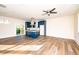 Spacious kitchen with island, stainless steel appliances, and blue cabinetry at 2407 Hart Street # B, Durham, NC 27703