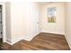 Well-lit bedroom with wood floors and double closets at 2407 Hart Street # B, Durham, NC 27703