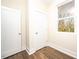 Light bedroom with wood floors and closet at 2407 Hart Street # B, Durham, NC 27703