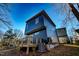 Back exterior showcasing home's modern design and deck at 2407 Hart Street # B, Durham, NC 27703