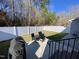 Fenced backyard with patio, grill, and seating area at 26 Wildberry Ct, Rocky Mount, NC 27804