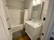 Clean bathroom with a bathtub, vanity, and mirror at 26 Wildberry Ct, Rocky Mount, NC 27804