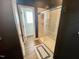 Bathroom with a walk-in shower and modern fixtures at 26 Wildberry Ct, Rocky Mount, NC 27804