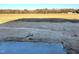 Land with a concrete slab in the backyard of a new home at 260 Olivia Crossing Ct # 9, Four Oaks, NC 27524