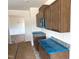 Gourmet kitchen boasts rich cabinetry, modern appliances, and sleek countertops at 260 Olivia Crossing Ct # 9, Four Oaks, NC 27524