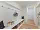 Well-organized mudroom featuring a built-in bench with storage cubbies and coat hooks at 260 Olivia Crossing Ct # 9, Four Oaks, NC 27524