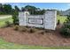 Stone sign for the Chamblee community with manicured landscaping at 260 Olivia Crossing Ct # 9, Four Oaks, NC 27524