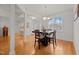 Charming dining area with hardwood floors and a wood table at 312 Ashwick Dr, Efland, NC 27243