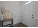 Spacious entryway with two doors and hardwood flooring at 313 Page Square Dr, Cary, NC 27513