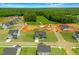 Aerial view of neighborhood with tree line in the background, homes and construction at 467 Ravensworth Dr, Garner, NC 27529