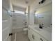 A bathroom with a toilet, tub, shower, and vanity with a white countertop and sink at 467 Ravensworth Dr, Garner, NC 27529