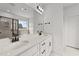 Double vanity bathroom with modern finishes and a large mirror at 467 Ravensworth Dr, Garner, NC 27529