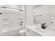 Clean bathroom featuring a shower tub combo and a vanity with mirror at 467 Ravensworth Dr, Garner, NC 27529