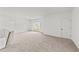 Spacious bonus room with window and carpet at 467 Ravensworth Dr, Garner, NC 27529