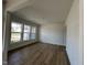 Dining room with hardwood floors, crown molding, and large windows that let in an abundance of natural light at 467 Ravensworth Dr, Garner, NC 27529