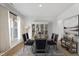 Virtual staging of a dining room, featuring modern furnishings and bright lighting at 467 Ravensworth Dr, Garner, NC 27529