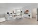 Spacious living room featuring a comfortable sectional sofa and neutral decor at 467 Ravensworth Dr, Garner, NC 27529