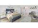 Comfortable main bedroom with plush bedding, neutral decor, and ensuite bathroom access at 467 Ravensworth Dr, Garner, NC 27529