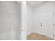 This mud room features neutral flooring, door to exterior, and shelving at 467 Ravensworth Dr, Garner, NC 27529