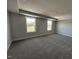 This neutral bedroom offers carpet, multiple windows and ample space at 505 Ravensworth Dr, Garner, NC 27529