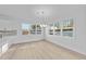 Bright dining area with hardwood floors and large windows at 505 Ravensworth Dr, Garner, NC 27529