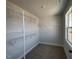 Spacious walk-in closet with ample shelving for organization and storage at 505 Ravensworth Dr, Garner, NC 27529