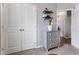 Charming bedroom featuring a dresser, closet, gray walls, and a decorative shelf at 58 Northview Dr, Middlesex, NC 27557