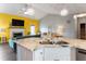 Open concept kitchen with granite counters overlooks the living area with fireplace at 58 Northview Dr, Middlesex, NC 27557