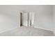 Bedroom with plush carpeting and multiple doorways leading to other rooms at 60 Accord Dr, Youngsville, NC 27596
