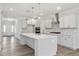 Beautiful kitchen with a large island, stainless steel appliances, and ample counter space at 60 Accord Dr, Youngsville, NC 27596