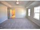 Large main bedroom featuring plush carpet, and an en-suite bathroom at 60 Accord Dr, Youngsville, NC 27596