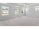 Bright primary bedroom with multiple windows and trey ceiling at 60 Accord Dr, Youngsville, NC 27596