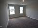 Bedroom with neutral carpet and two windows for natural light, ready to be personalized at 70 Accord Dr, Youngsville, NC 27596
