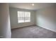 Bedroom with carpet flooring, natural light, and a peaceful ambiance at 70 Accord Dr, Youngsville, NC 27596