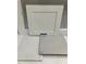 White kitchen cabinet sample with countertop and flooring options at 70 Accord Dr, Youngsville, NC 27596