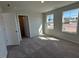 Carpeted bedroom with three windows offering natural light at 75 Calabria Ct, Franklinton, NC 27525