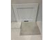Material samples featuring a white Elkins cabinet door, and granite and floor tiles at 75 Calabria Ct, Franklinton, NC 27525