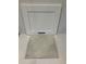 Material samples featuring a white Elkins cabinet door and a floor tile at 75 Calabria Ct, Franklinton, NC 27525